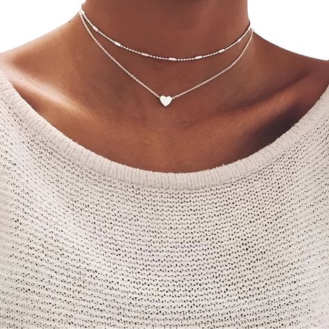 Elevate any outfit with our exquisite collection of short silver necklaces. Crafted from premium sterling silver, each minimalist yet statement-making piece showcases sleek designs