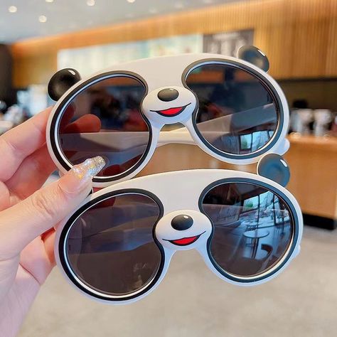 Stand out in style with Panda Sunglasses - trendy shades inspired by nature's cutest icon. Eco-friendly design, polarized lenses for ultimate protection and a dash of whimsy.