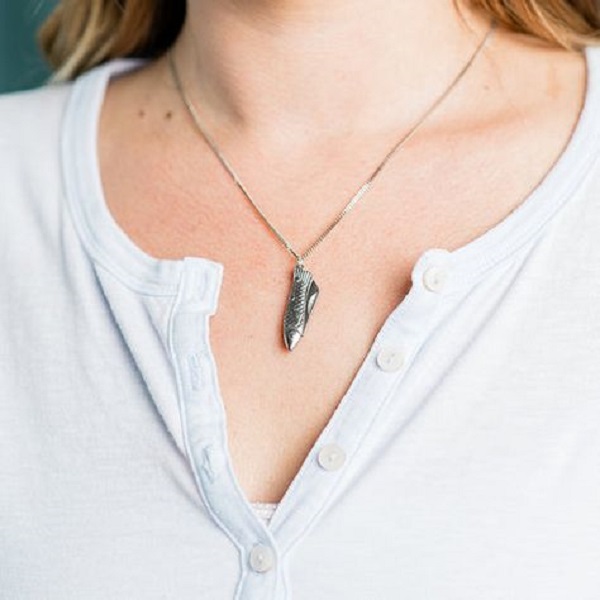 Curious about what a knife necklace is