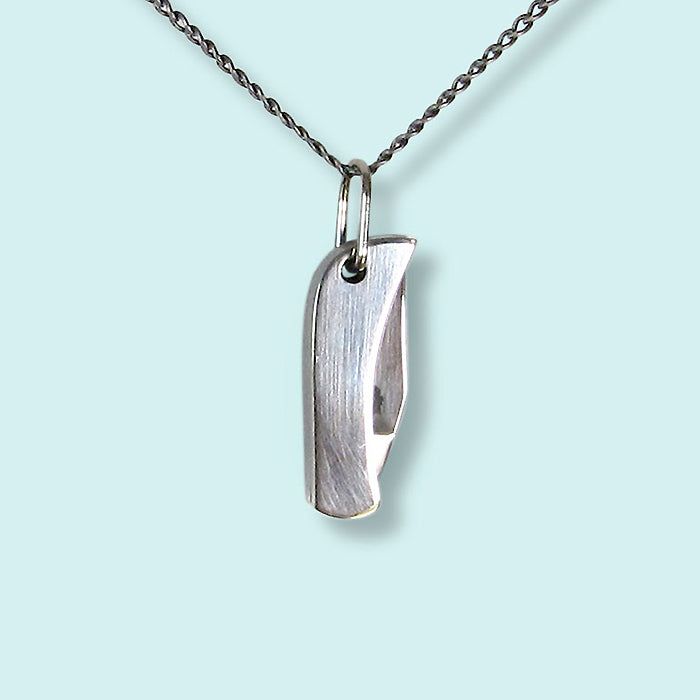 Curious about what a knife necklace is