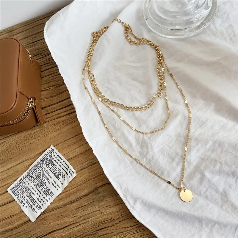 layering necklaces gold
