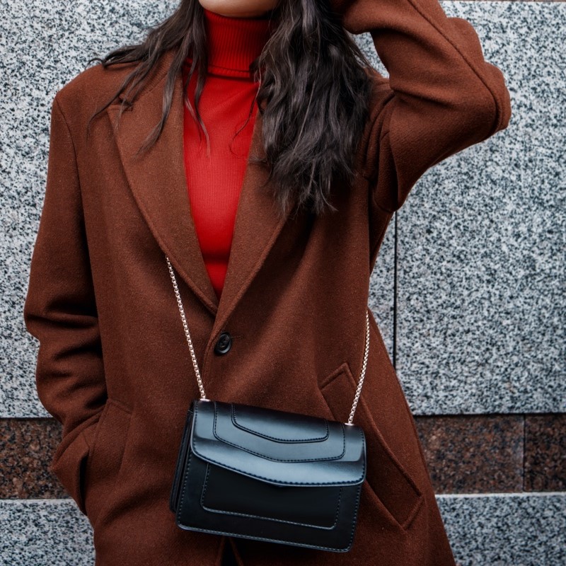 where should a crossbody bag sit