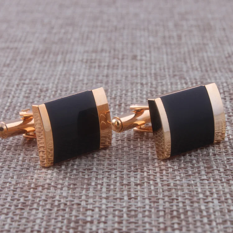 putting on cufflinks