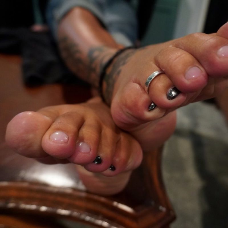 toe ring tattoos