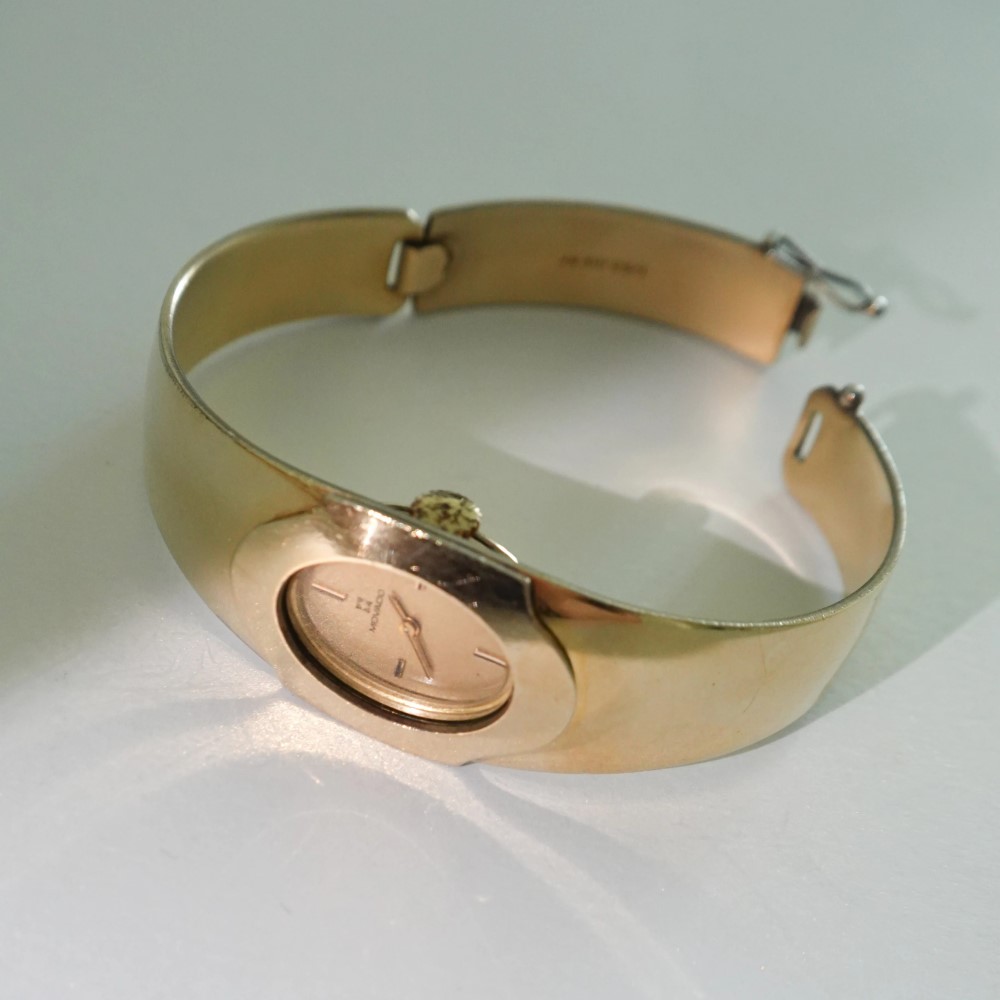 gold bangle watch