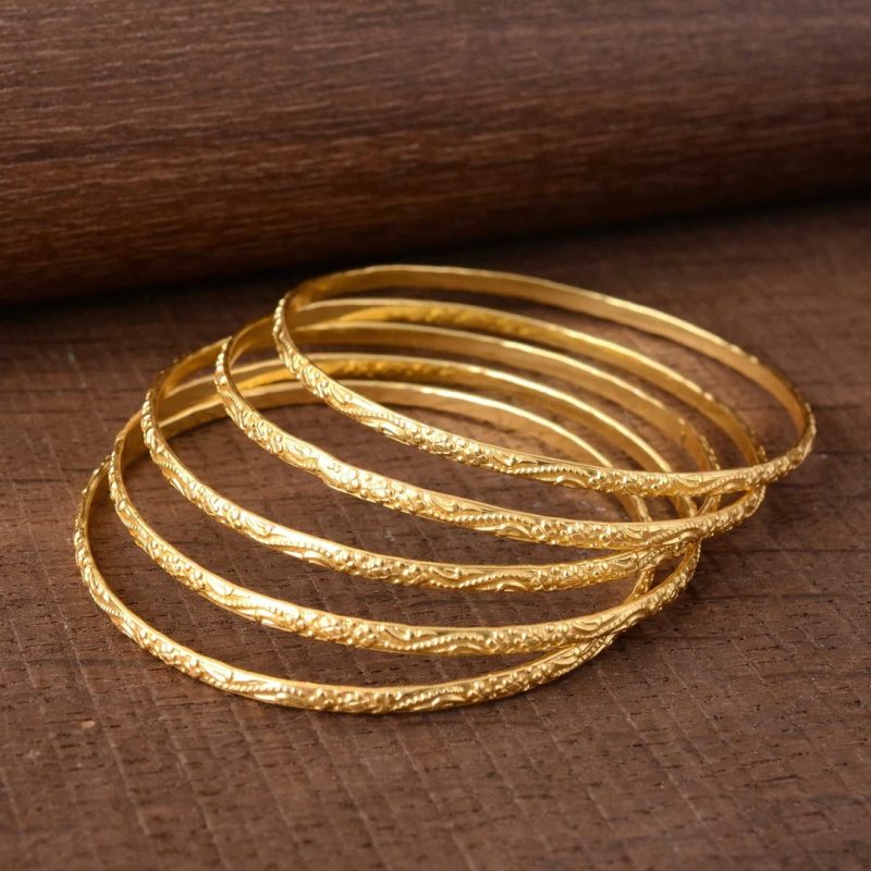 gold bangle stack